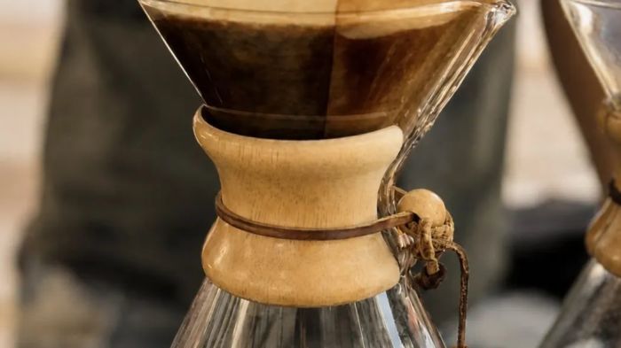 Pouring hot water over coffee in a Chemex
